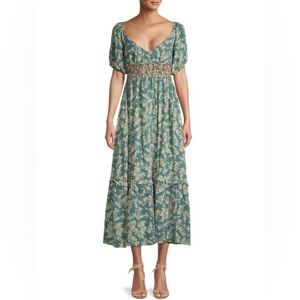 FREE PEOPLE Ellie Printed Midi Dress with an A-line Silhouette